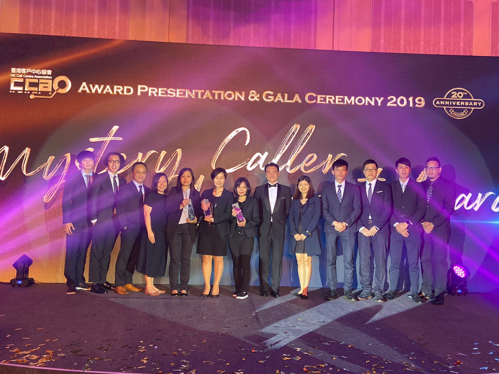 Eva Wong, Director of Client and Services Management of BCT Group (sixth from left), received the awards from Chapman Lam, Chairman of HKCCA (sixth from right), along with representatives of client services team